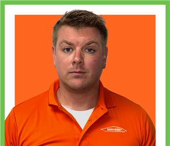 eddy, servpro employee, orange background